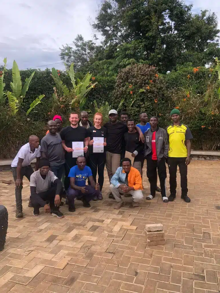 Lenka Poláčková receiving her mount Kilimanjaro certificate from Tranquil Kilimanjaro guides