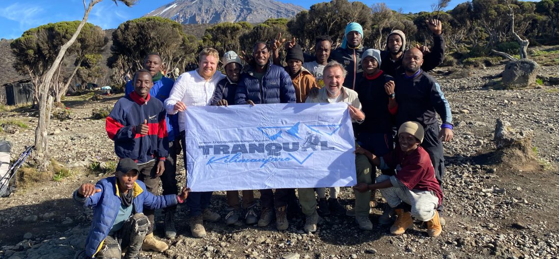 50 year old celebrates climbing Mount Kilimanjaro
