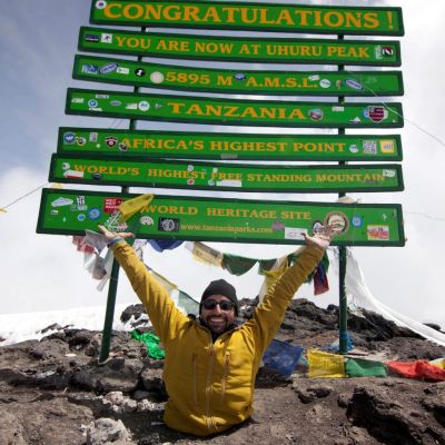 Man who lost his legs as a child climbs Kilimanjaro by crawling on his HANDS for seven days