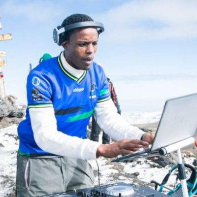 It ok to listen to music while climbing Kilimanjaro but having a whole DJ turn up at the summit with sound equipment and turntables, Uhuru Peak is just Extra!