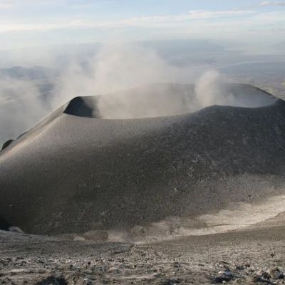 Ol Doinyo Lengai, the strange mountain of God spewing carbonatite black lava that turns white
