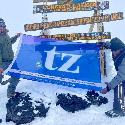 TCRA conquers Mt Kilimanjaro to promote .TZ Domain registration over .com for climbing-kilimanjaro companies