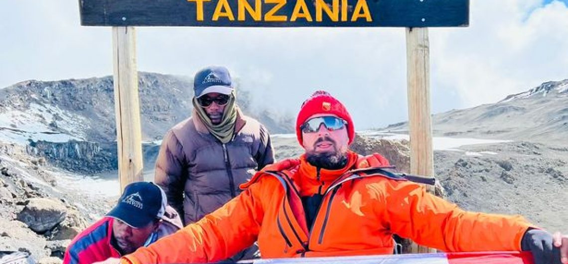 Manchester united fan climbs Kilimanjaro
