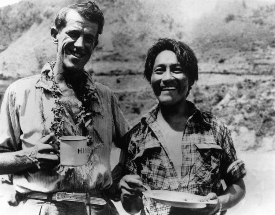 Hillary and Tenzing celebrating after becoming the first persons to climb Everest